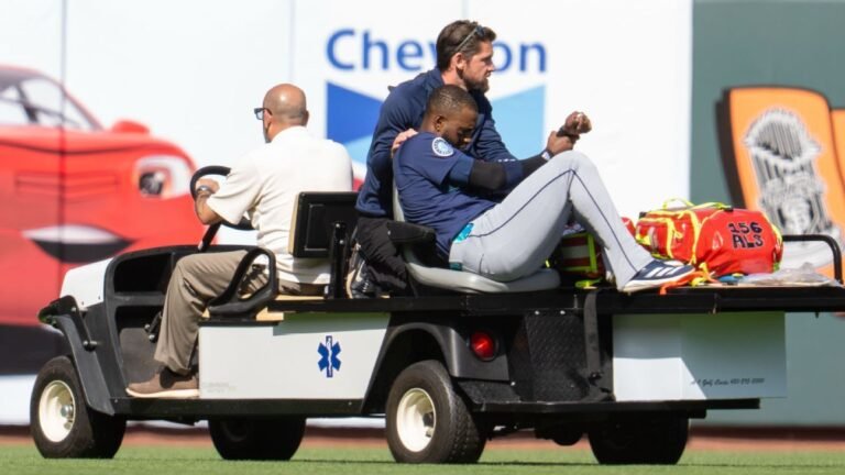 Mariners place OF Victor Robles on IL, recall Dominic Canzone