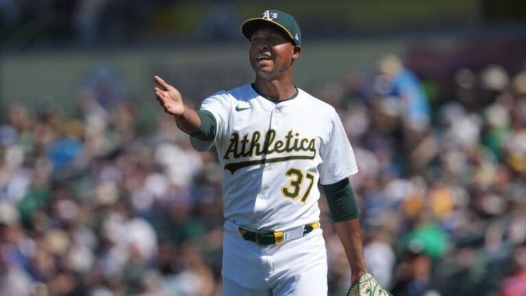 Athletics place Jose Leclerc on injured list due to lat strain