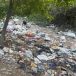 Garbage dumped near forest area on Karanai Main Road remains uncleared