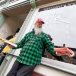 Why a Michigan community formed a human chain to move 9,100 books, one at a time