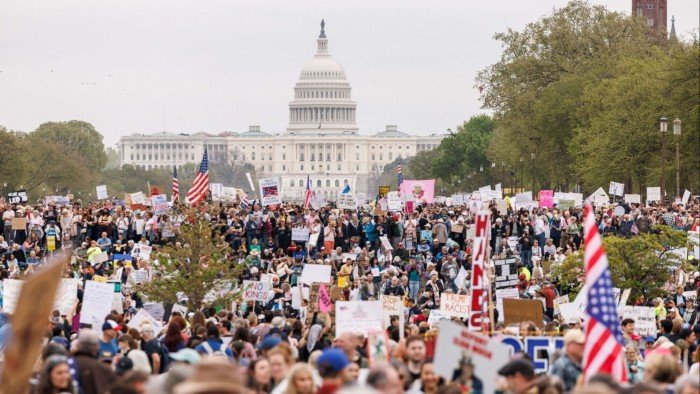Thousands join protests against Donald Trump and Elon Musk