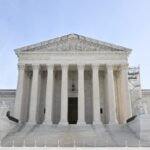 US Supreme Court temporarily halts deportations of migrants