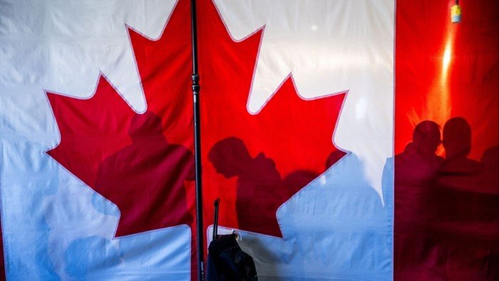 Canadians vote to choose leader in election dominated by Trump