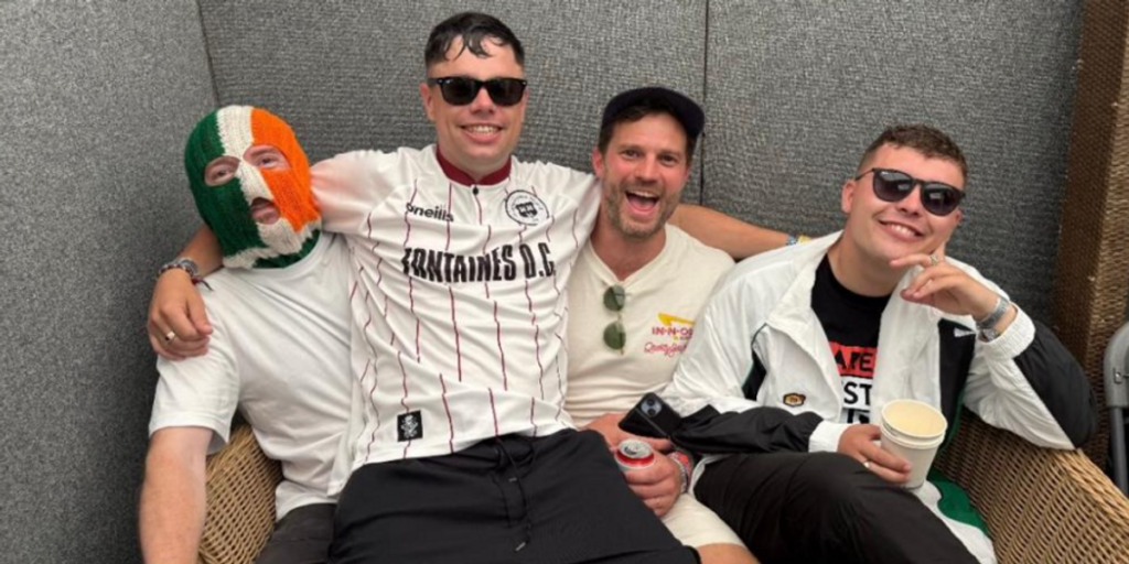 Jamie Dornan, 43, sparks fiery debate as he poses with Kneecap amid Glastonbury controversy: ‘Not a good look!’