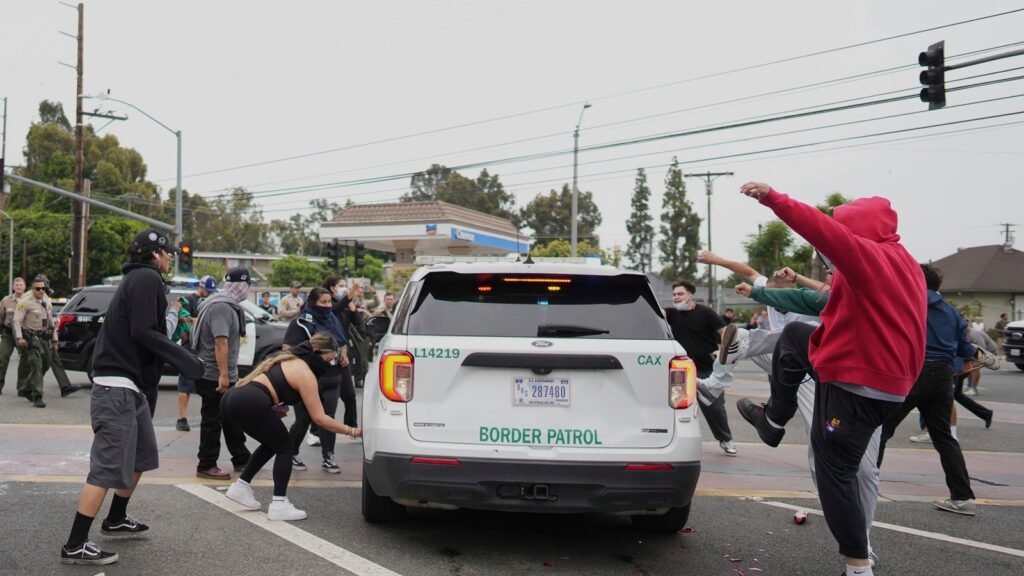 Clashes resume for second day in Los Angeles as immigration raids draw new protests | World News