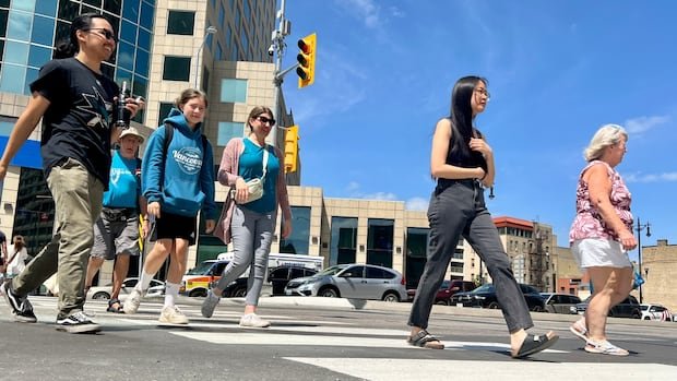 Portage and Main reopens to pedestrians, marking ‘historic moment’ for Winnipeg