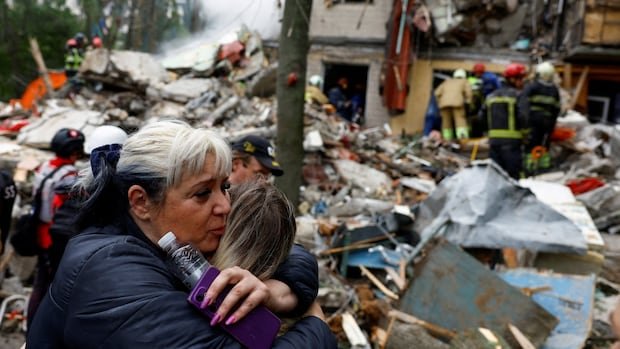 Russian missile, drone attacks hit Kyiv, killing 8 people and wounding 82