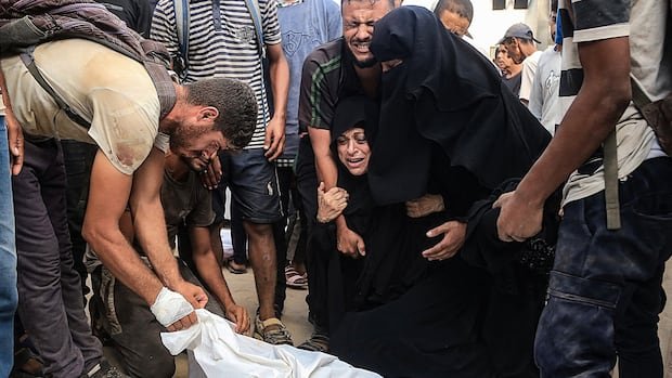 Israeli troops fatally shoot 32 Palestinians trying to reach aid sites: Gaza officials
