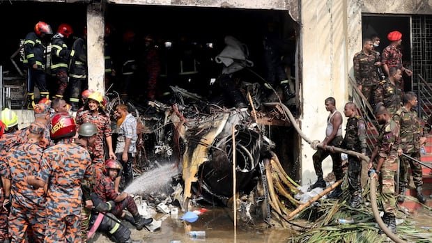 At least 19 killed after Bangladesh air force plane crashes into college campus