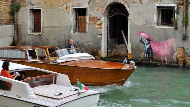 Banksy artwork removed from Venetian palazzo so it can be restored