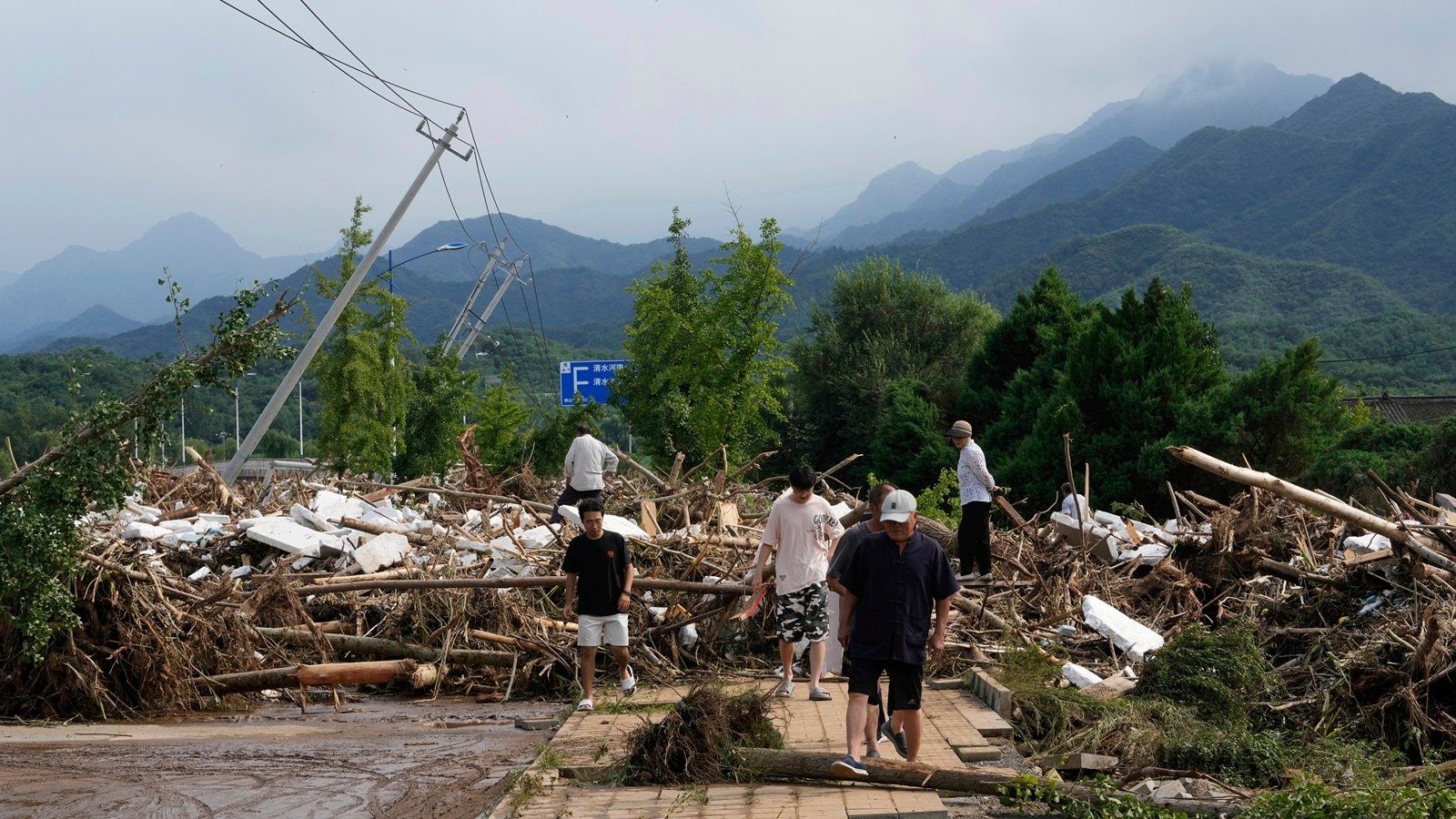 Heavy rains, flooding kill at least 34 people in and near Beijing | World News