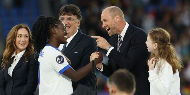 Prince William celebrates with Lionesses on the pitch after nail-biting victory
