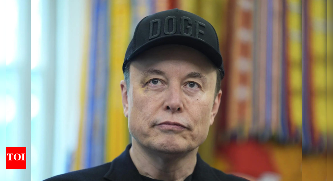Elon Musk targets Microsoft on Twitter, user replies; Tesla CEO joins in with …