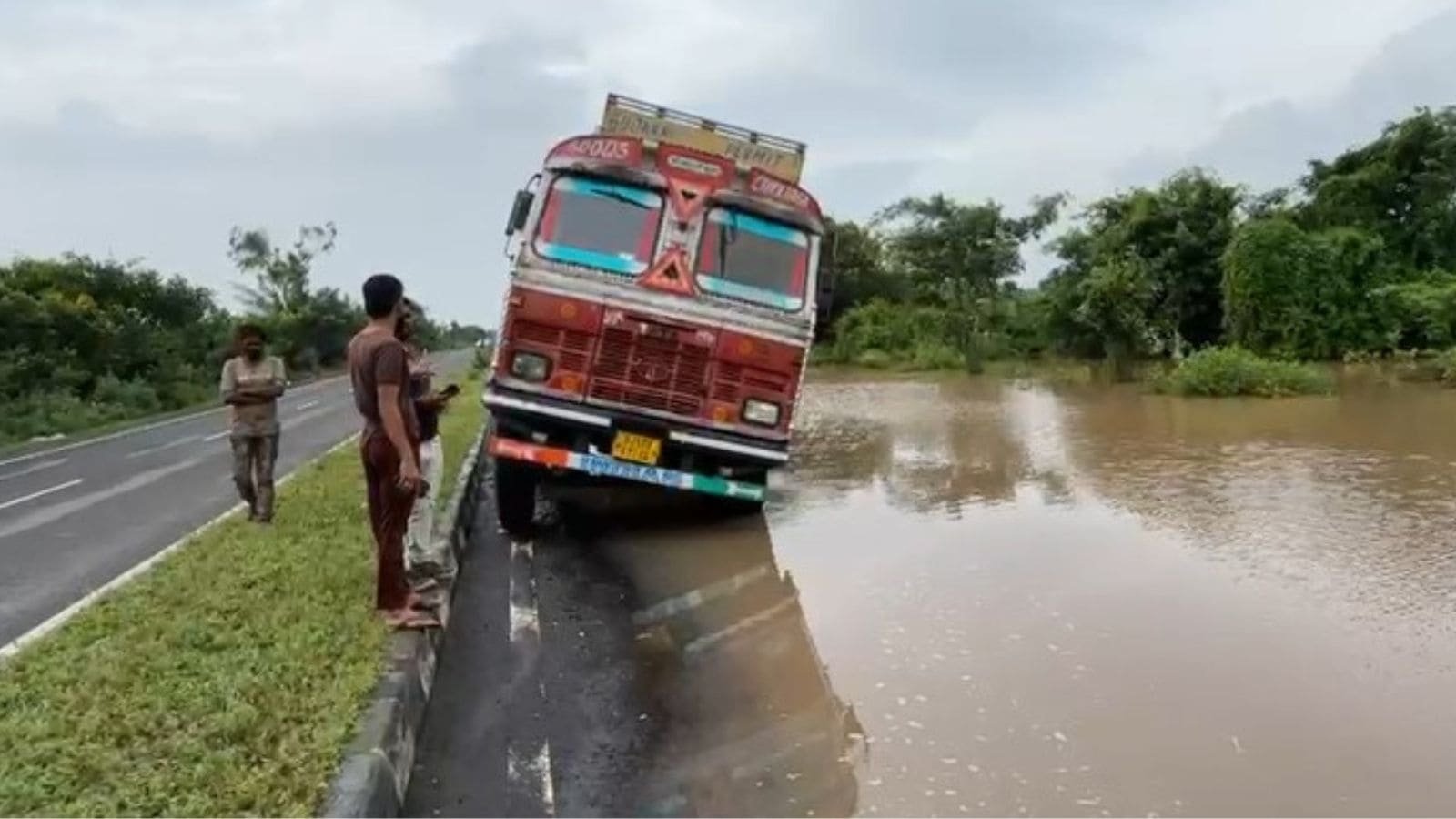 In Gujarat’s Mahisagar, section of road leading to historic Mangadh Hill site washed away; car slips into valley | Ahmedabad News