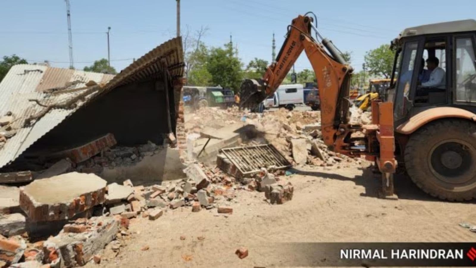 400 structures along Sabarmati banks in Gandhinagar razed as two-day demolition drive kicks off | Ahmedabad News