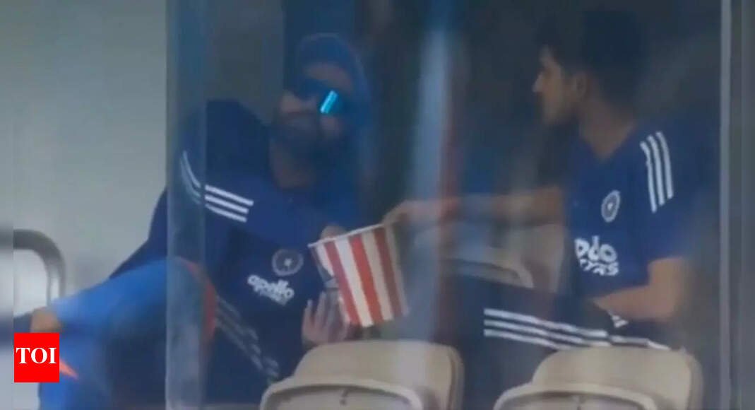 Rohit Sharma and Shubman Gill caught munching popcorn during rain delay – WATCH | Cricket News